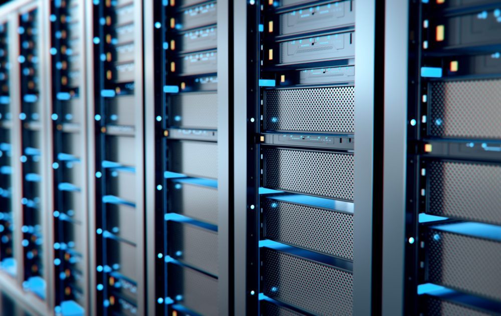Close-up of secure server racks with blue indicator lights used for managed website hosting by O'Brien Media
