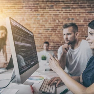 Programmer working in a software develop company office