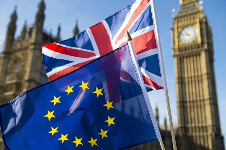 European Union and British Union Jack flag flying in front of Big Ben and the Houses of Parliament