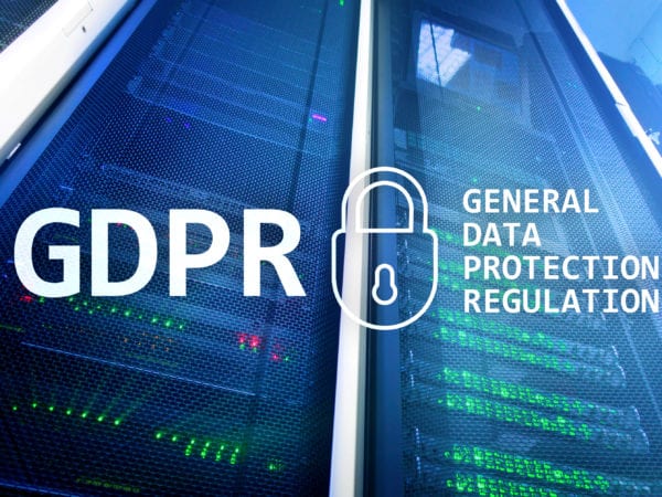GDPR, General data protection regulation compliance logo. Server room background.