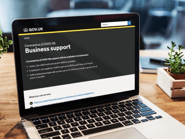 laptop with the government business support website