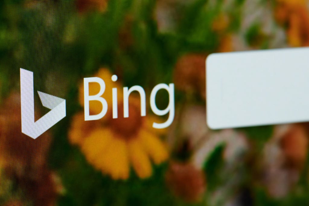Bing search home page on laptop screen close up