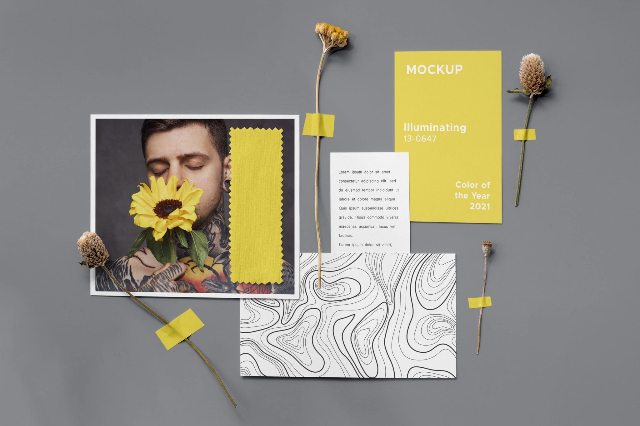 grey background and on front there is a photo of a person smelling a flower, 4 different flowers and a business card