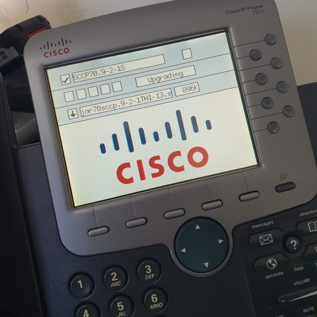 A telephone displaying Cisco app