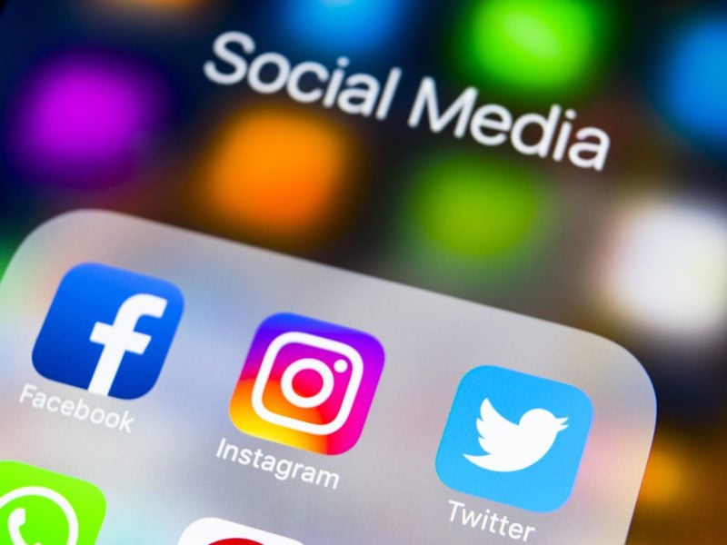 Facebook, Instagram, and Twitter social media icons social media logos on a mobile
