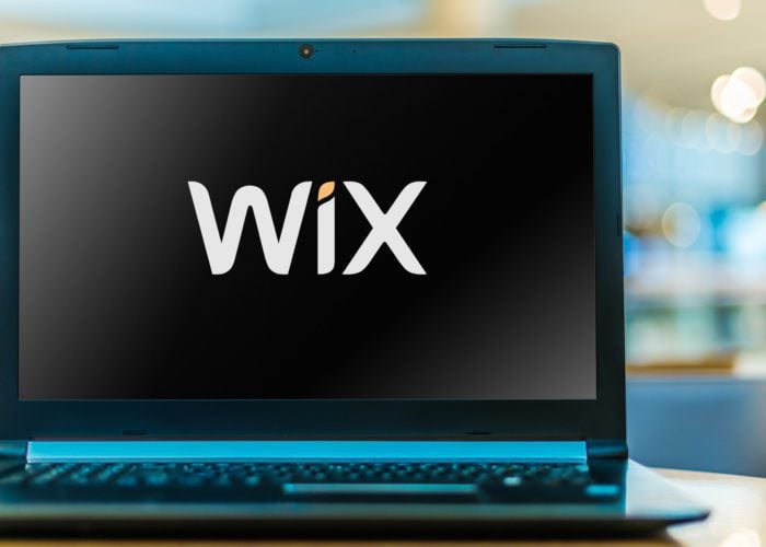 Laptop computer displaying logo of Wix