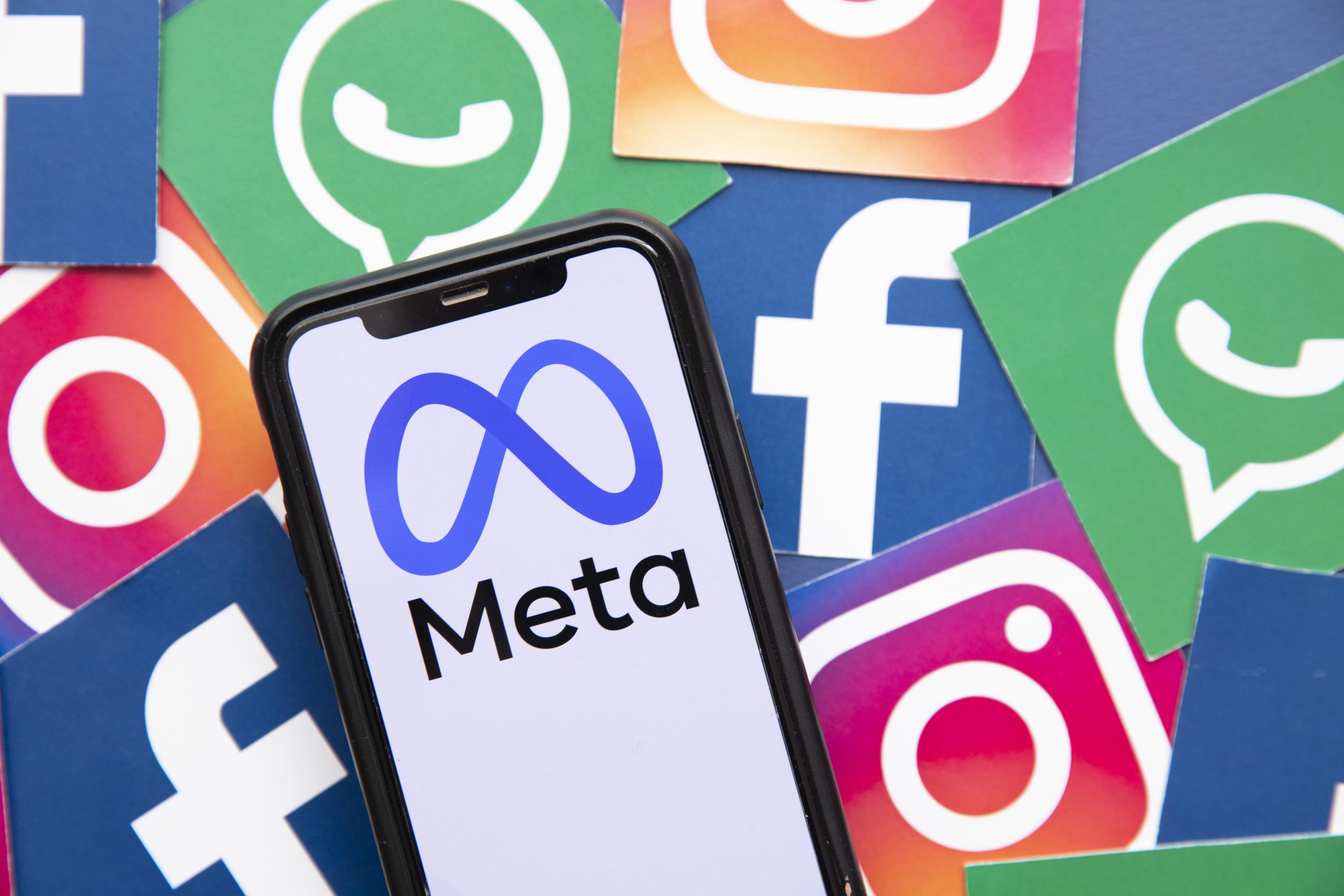 A Meta logo on a mobile