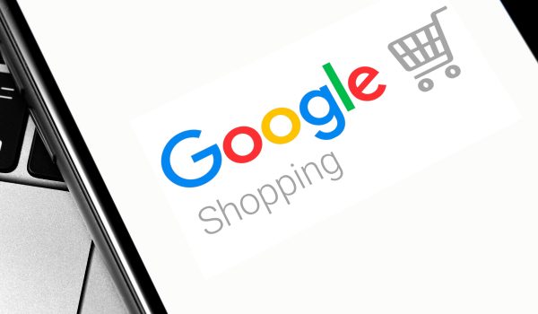 notebook and smartphone with Google Shopping logo on the screen. Google is the biggest Internet search engine in the world. Moscow, Russia - April 27, 2019