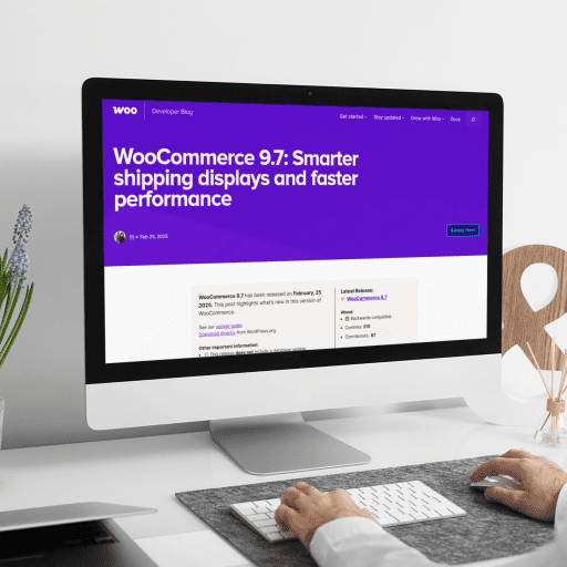Man working on an iMac with a WooCommerce dashboard on screen