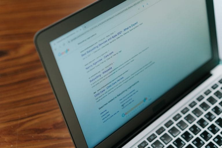 Google search results displaying on a Laptop Computer